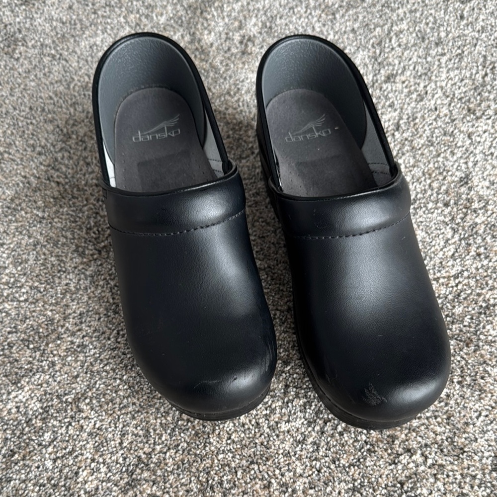 Sleek Black Leather Clogs